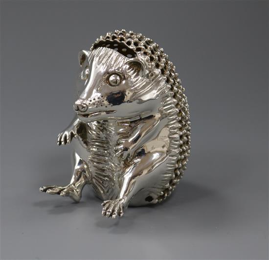 A 1990s novelty silver seated hedgehog money box by Asprey & Co Ltd, London, 1994, 12 oz.